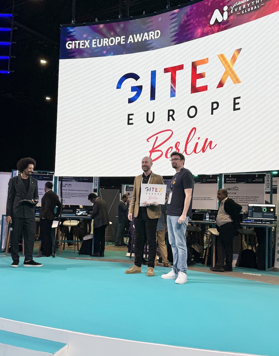 Professional.me team on stage after winning the Gitex Europe award in Berlin